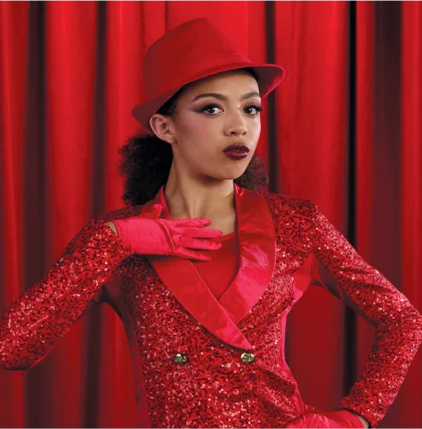Broadway category tile — performer in shimmering red sequined dress