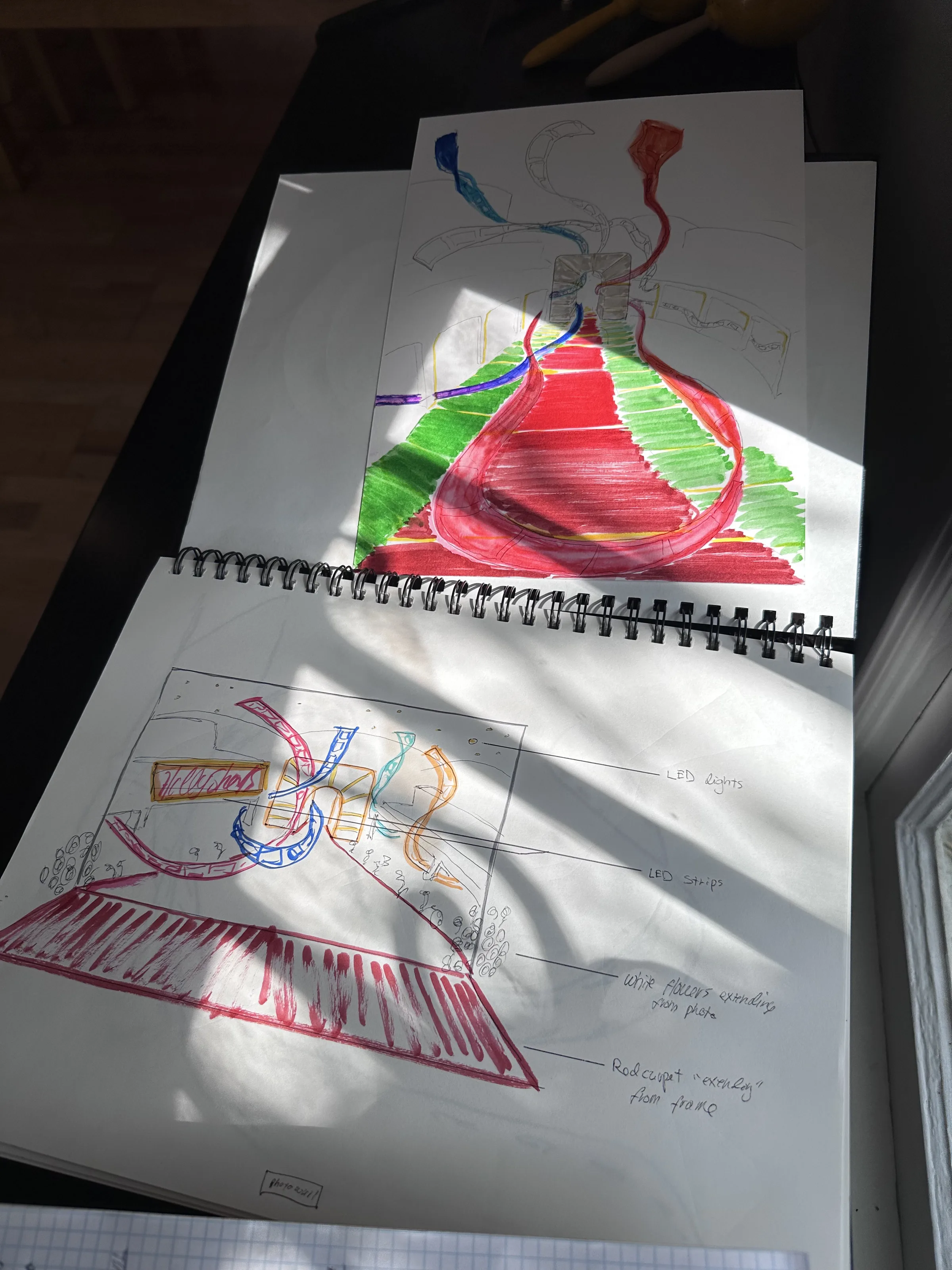Sketchbook with color studies and concept drawings
