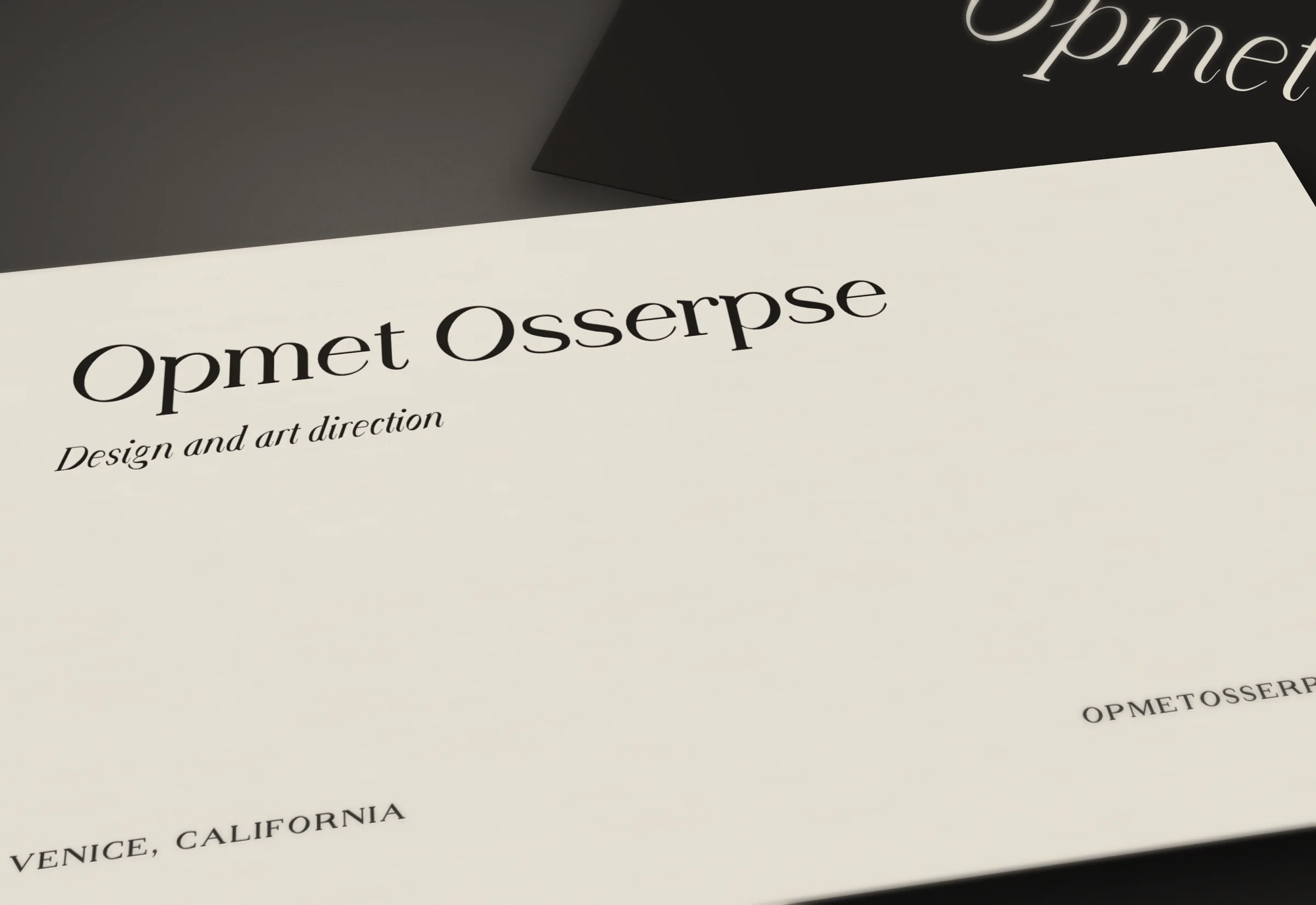 Letterpress business cards for Opmet Osserpse: the name in Display Regular, the address in small caps.
